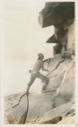 Image of George Borup climbing the Oo-ma-nak